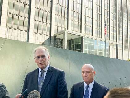 PG&E Corp. CEO Bill Johnson and Pacific Gas & Electric Co. CEO Andrew Vesey speak with the media Tuesday, Sep. 17, outside the federal courthouse in San Francisco, Calif. after a hearing in the utility?s ongoing probation case.
