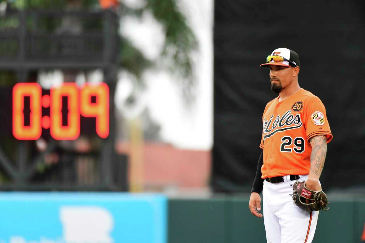 SARASOTA, FLORIDA - FEBRUARY 26: Jace Peterson #29 of the Baltimore Orioles stands in front of a pitch clock during the eighth inning of a baseball game against the Tampa Bay Rays at Ed Smith Stadium on February 26, 2019 in Sarasota, Florida. (Photo by Julio Aguilar/Getty Images)