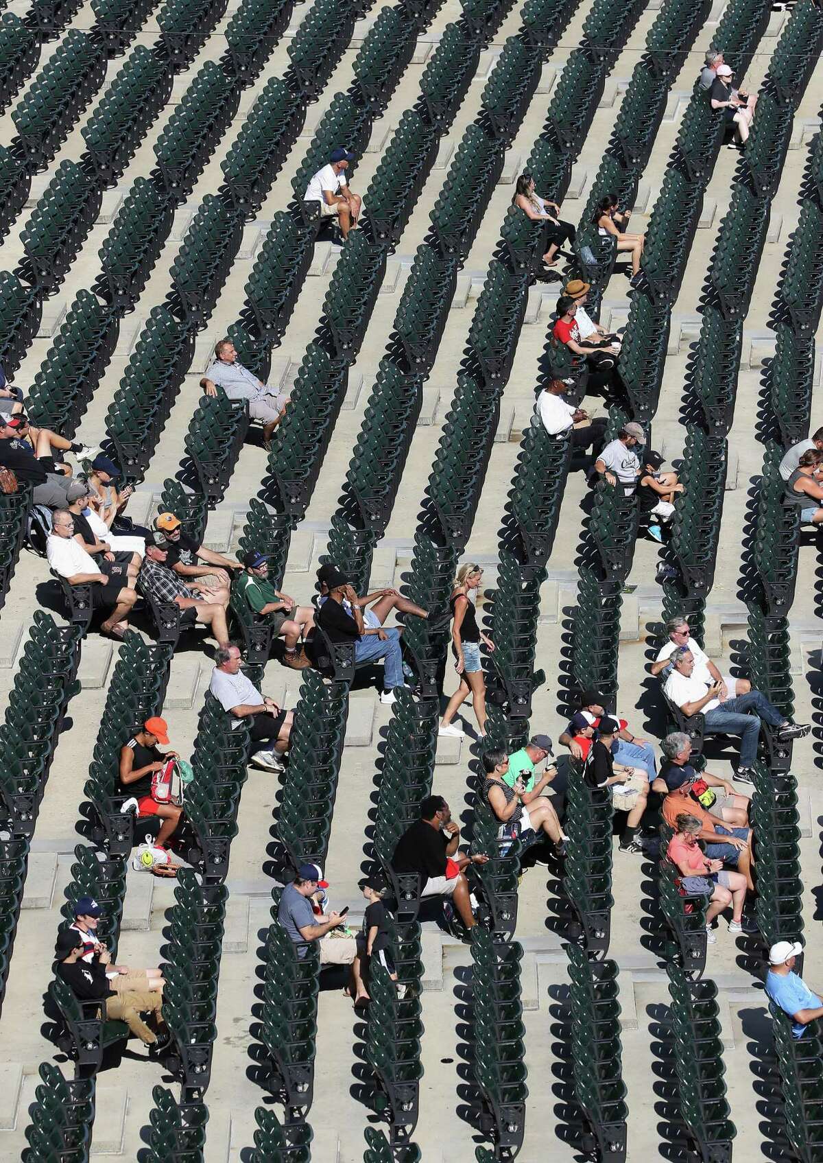 CHICAGO, ILLINOIS - AUGUST 13: A small crowd attends the first game of a double header at Guaranteed Rate Field between the Chicago White Sox and the Houston Astros on August 13, 2019 in Chicago, Illinois. (Photo by Jonathan Daniel/Getty Images)
