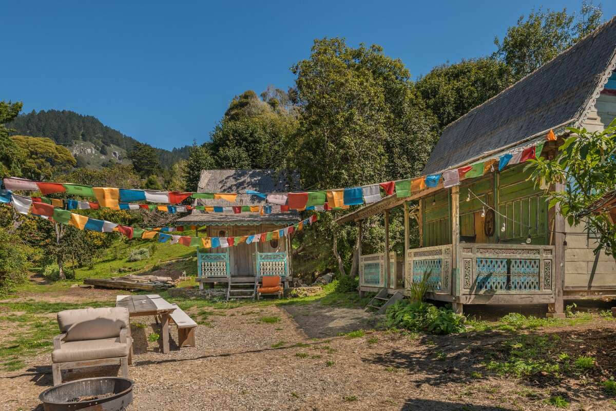 Dubbed "Willow Camp," it includes nearly three acres of beachfront property, including two main houses and several guest cabins.