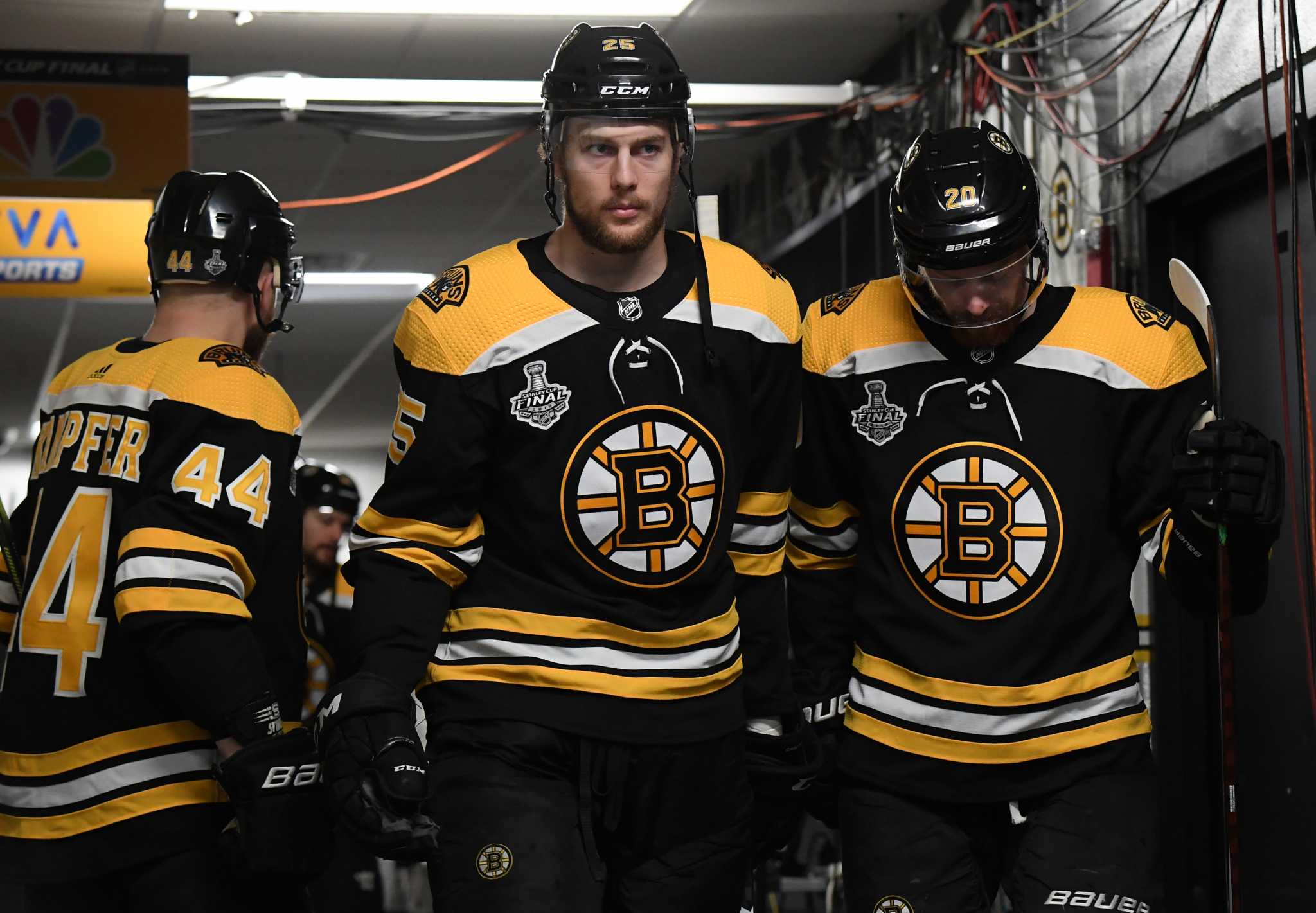 Bruins defenseman Brandon Carlo gets cut during practice