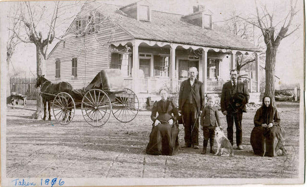 This image, taken in 1896, shows the Sommerfeldt Farm, which was located between Highland and Marine. From left are Aunt Emily, Uncle Alfred, Cousin Albert (5 years old), Prince the Dog, Uncle Frank and Grandmother Andine Sommerfeldt. In the background is Aunt Ceceila’s horse-and-buggy.