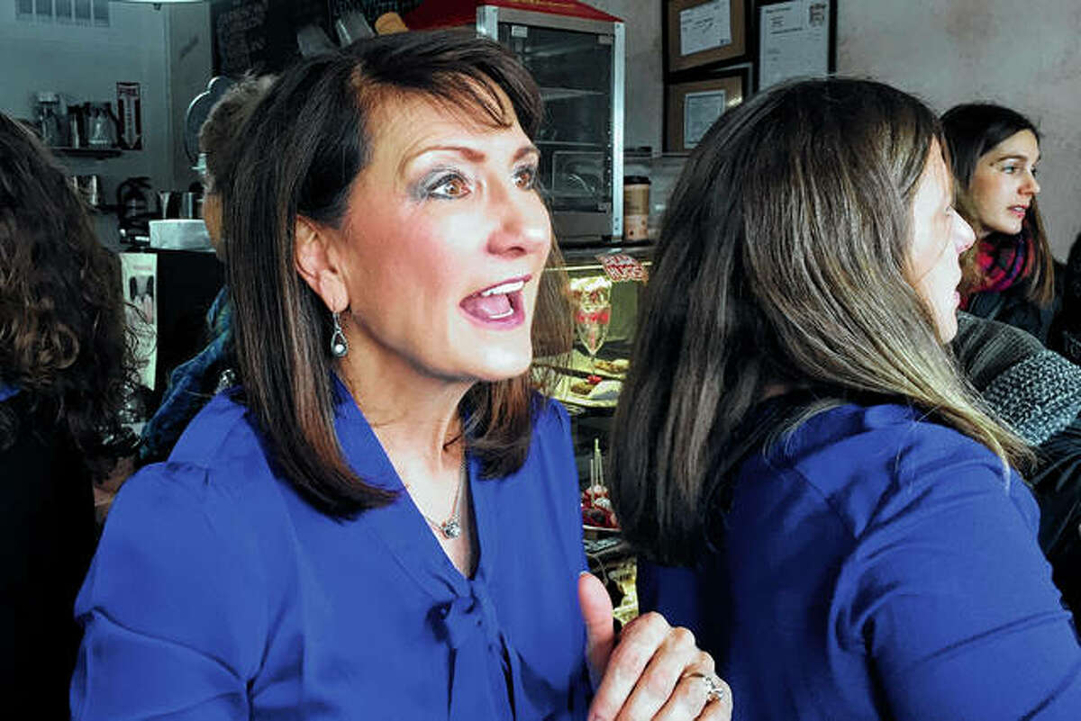 Marie Newman speaks with supporters in February 2018 at a campaign event in LaGrange. Rep. Alexandria Ocasio-Cortez is making her first endorsement of a liberal challenger to an incumbent House Democrat, backing Marie Newman in the primary against eight-term Rep. Daniel Lipinski in Illinois.