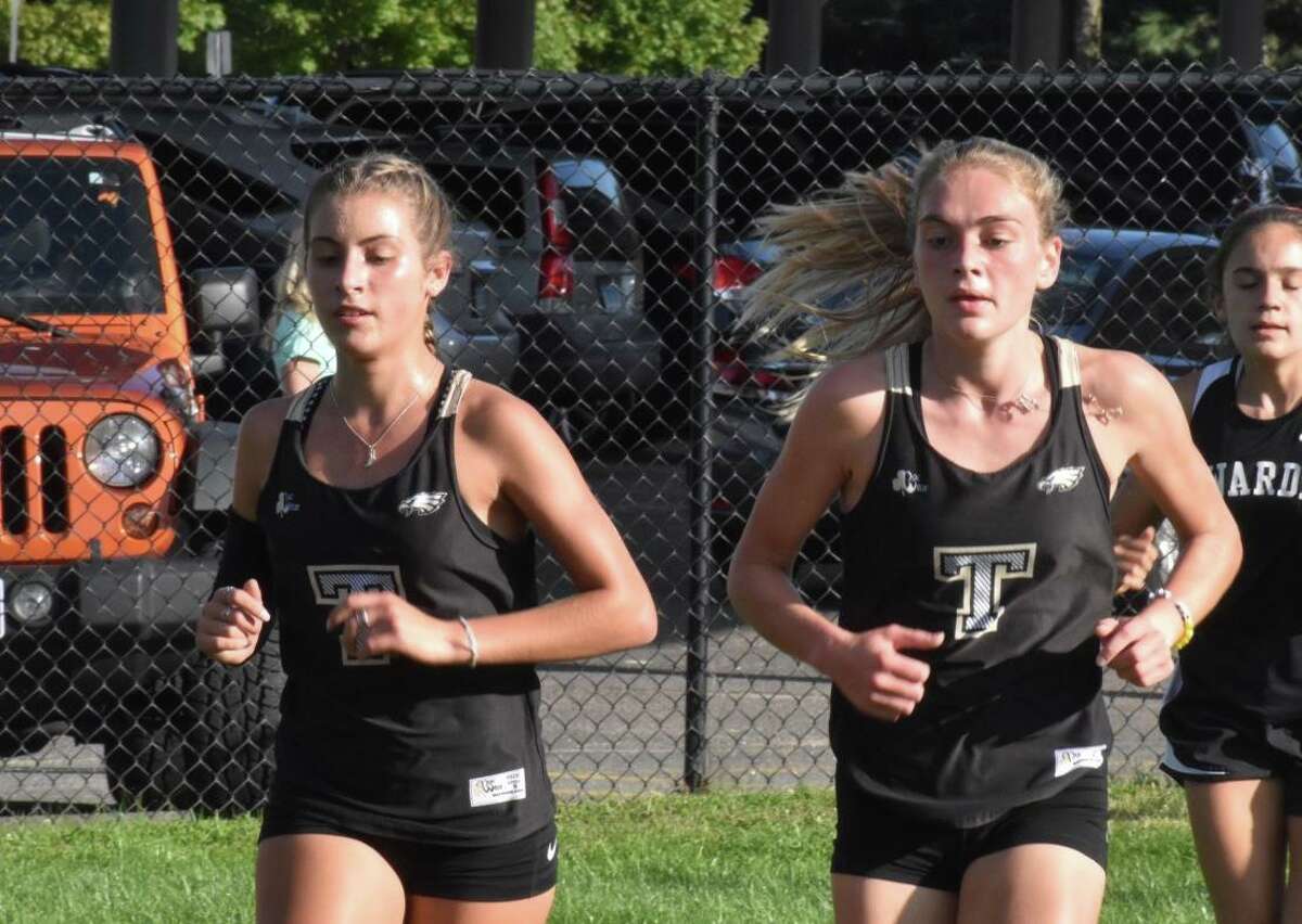 Trumbull seniors Alessandra Zaffina and Emily Alexandru led the Eagles to an FCIAC quad-meet sweep on Tuesday.