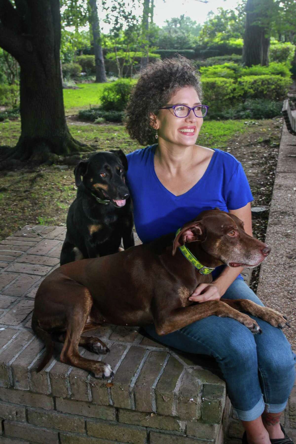 Jennifer Lopez, founder of Pupfit, an adventure exercise program for dogs, with her dogs Hazel and Xena.