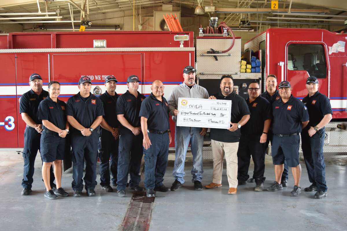 Local firefighters, volunteers exceed fundraising goal