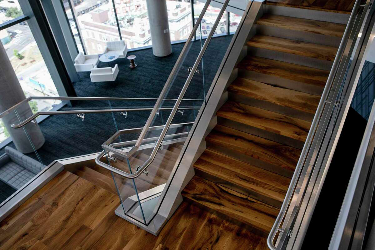 Stairs made from wood harvested from trees felled prior to construction of the new Frost Tower Building were reipurposed in the Frost Conference Center located on the 14th and 15th floors of the building.
