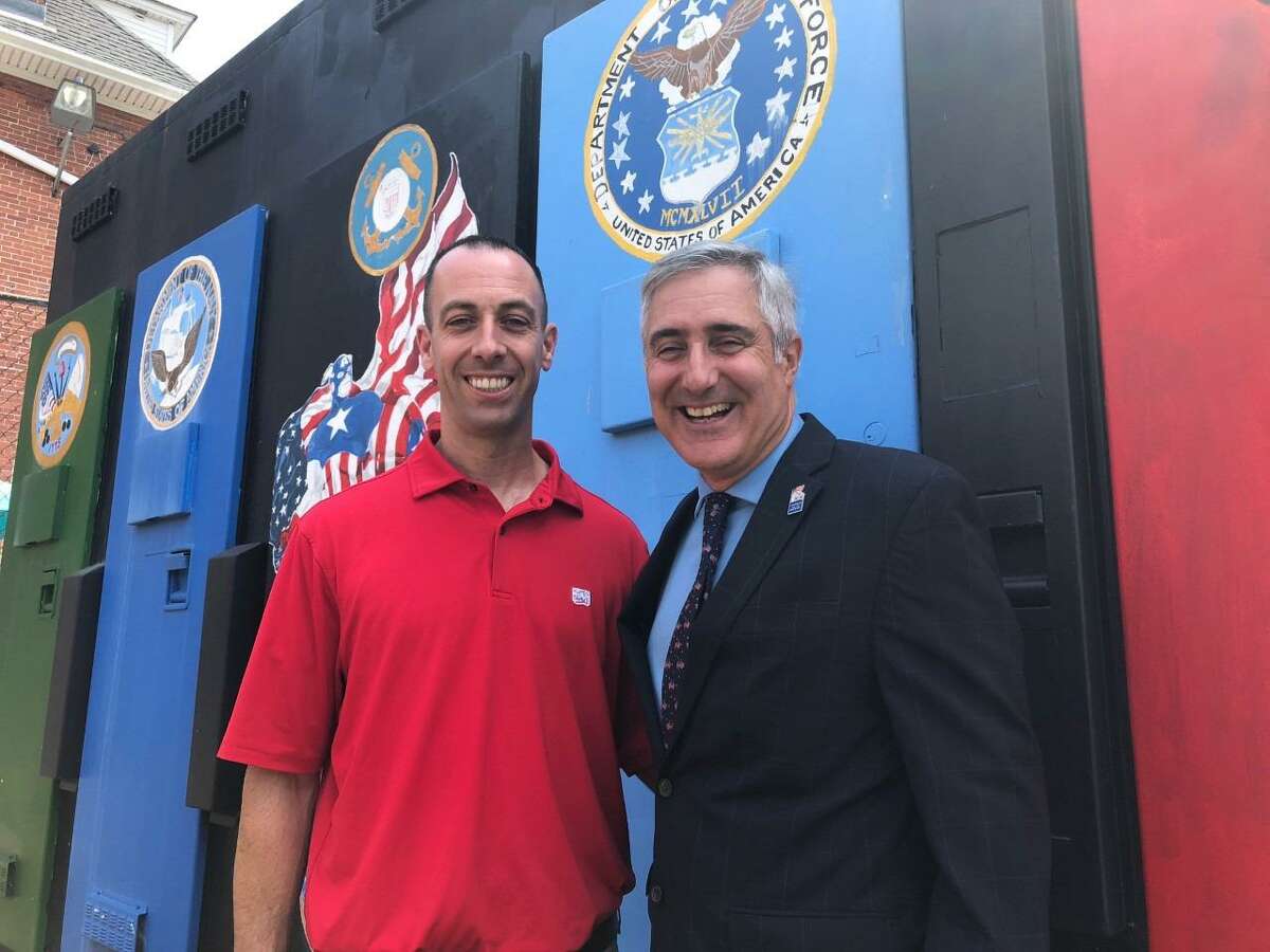 Robert Kozlowsky, left, a lieutenant with the Shelton Police Department, with Homes for the Brave Executive Director/CEO Vincent Santilli at organization’s main facility at 655 Park Avenue, Bridgeport. Kozlowsky is Homes for the Brave board chairman.