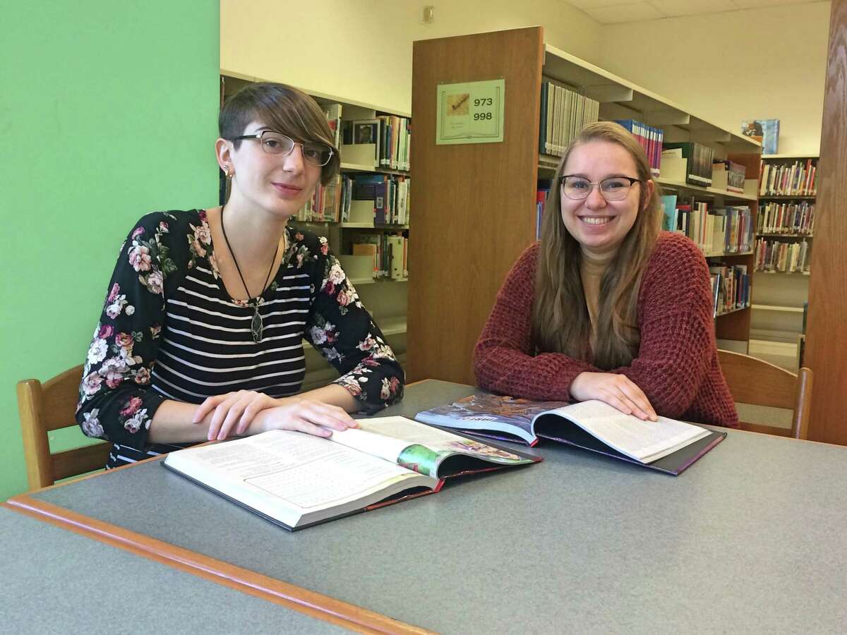 Chelsie Labrecque and Zanny Stowell have been surprised by the demand for the library system's Dungeons & Dragons clubs.