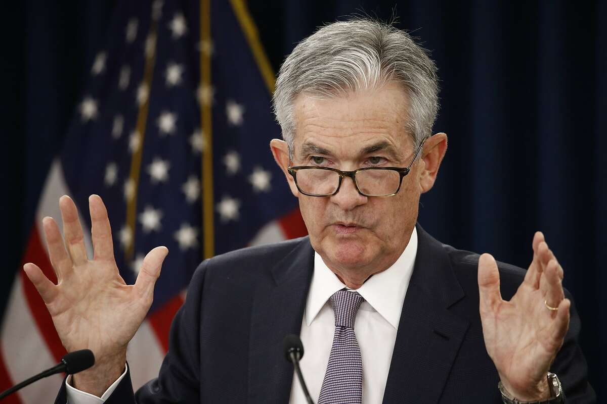 Fed cuts interest rates again