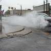A car splashes through puddled water on Texas 96 in Silsbee during Wednesday's rain showers. Photo taken Wednesday, 9/18/19