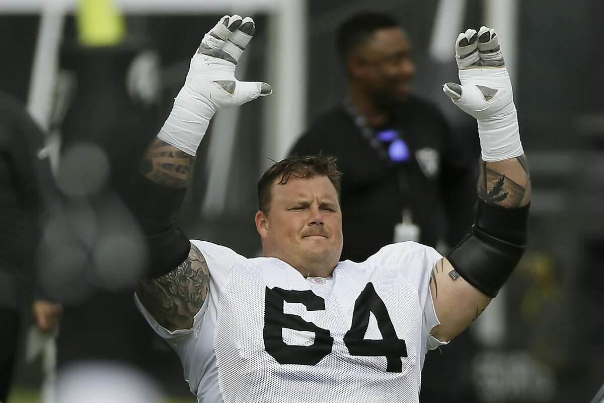 FILE - In this July 29, 2019, file photo, Oakland Raiders center Richie Incognito stretches during NFL football training camp in Napa, Calif. Guard Richie Incognito returns to the Raiders after missing two games for a suspension for violating the NFL's personal conduct policy. (AP Photo/Eric Risberg, File)