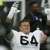 Thousand Oaks, United States. 18th Aug, 2021. Las Vegas Raiders guard  Richie Incognito (64) speaks to Los Angeles Rams vice president of  communications Artis Twyman during training camp on Wednesday, Aug 18