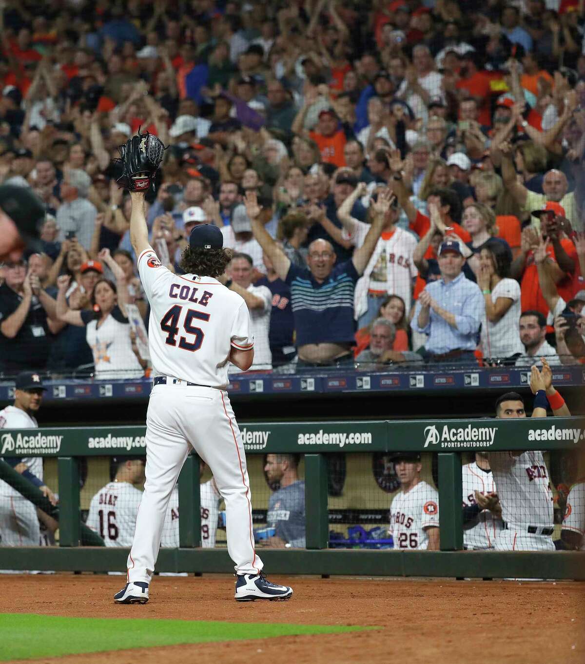 Houston Astros starting pitcher Gerrit Cole (45) waves to the fans after striking out Texas Rangers Shin-Soo Choo in the sixth inning to record his 300th strikeout this year during an MLB baseball game at Minute Maid Park, Wednesday, Sept. 18, 2019, in Houston.