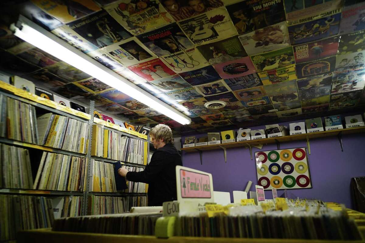 Employee Chris Lawrence organizes records at Last Vestige Music Shop on Wednesday, Sept. 18, 2019, in Albany, N.Y. (Paul Buckowski/Times Union)