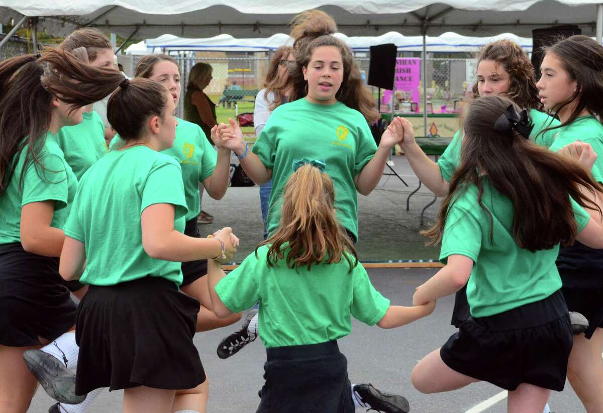 Nora Grillo, in center, with the Mulkerin School of Irish Dance, practices with the rest of the group during the annual Milford Irish Festival in Milford, Conn., on Friday Sept. 14, 2019.