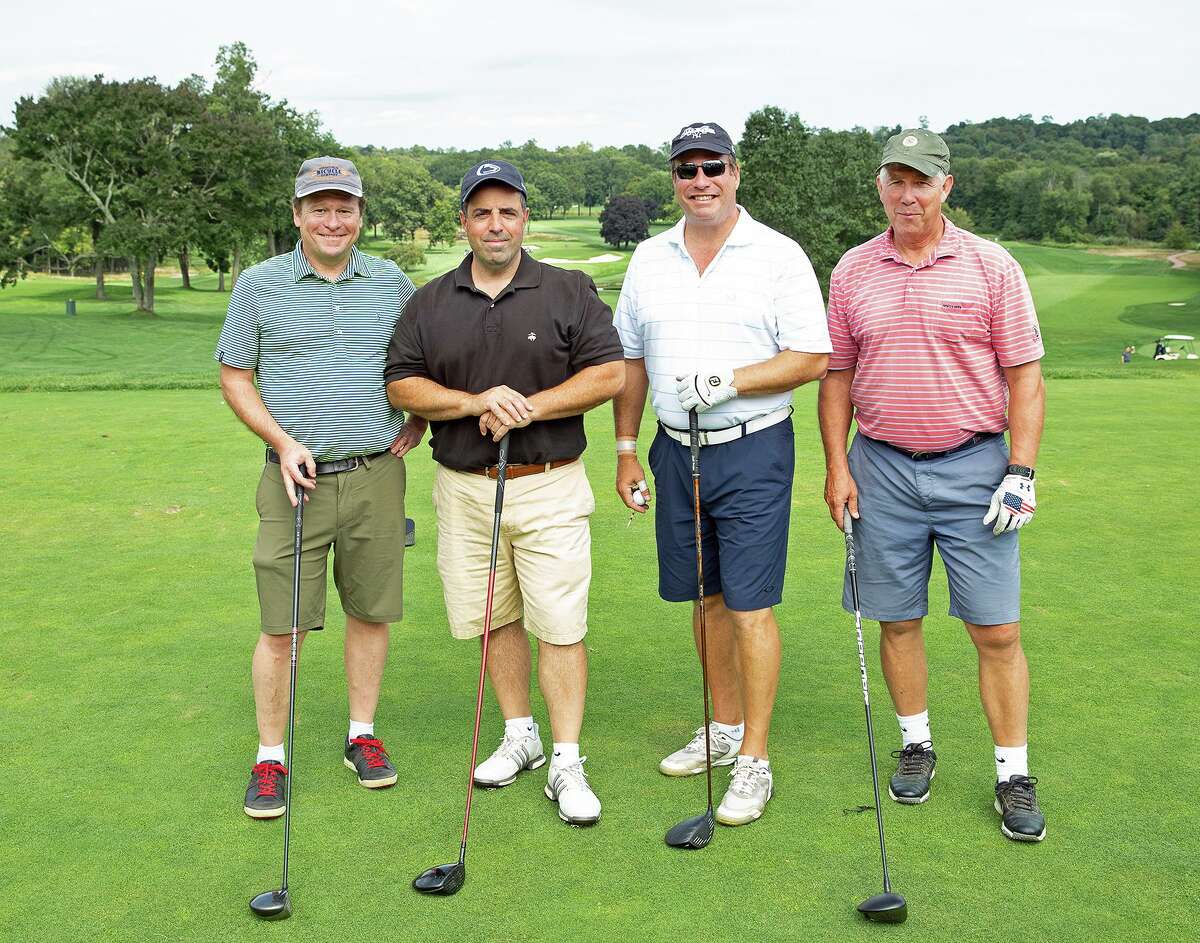 Geoffrey Morris and John Catizone, both of Ridgefield, Michael Diamond of Fairfield and Art Collins of Darien were among the foursomes during The Maritime Aquarium at Norwalk’s 9th annual Maritime Golf & Tennis Classic on Sept. 9 at Wee Burn Country Club. More than $170,000 was raised by 114 area business professionals to support the Aquarium’s education and conservation efforts.