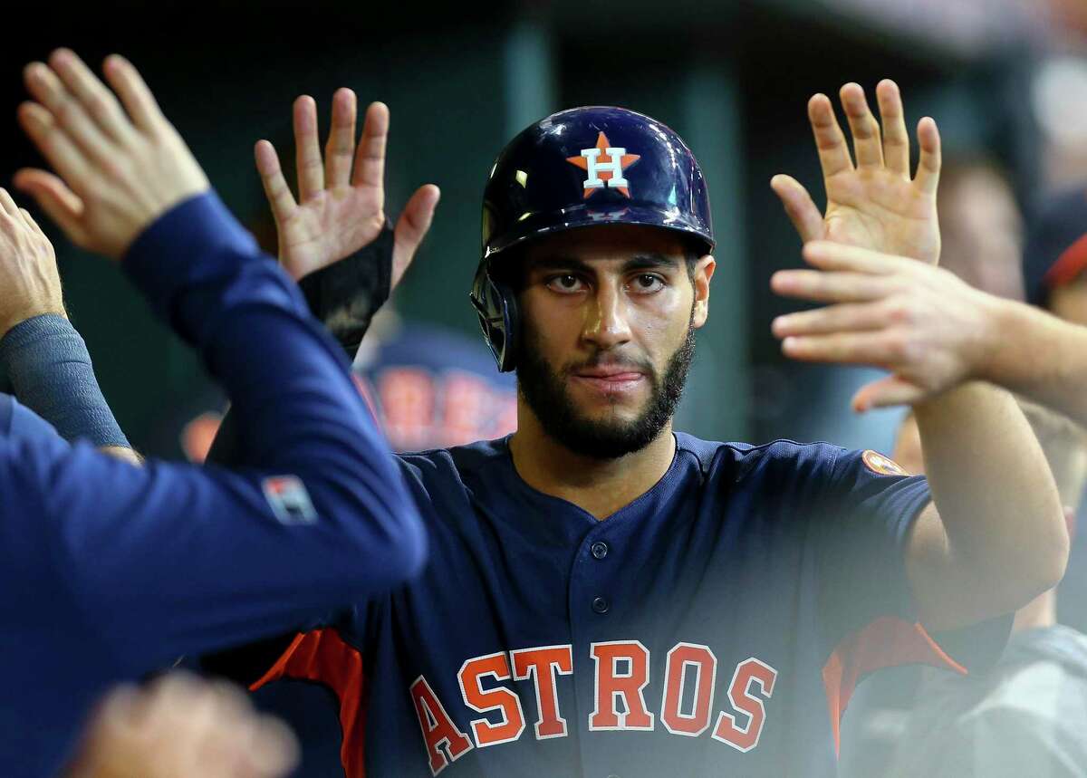 Houston Astros third baseman Abraham Toro (13) celrbaets with teammates in the dugout after scoring against the Seattle Mariners during the eighth inning of an MLB game at Minute Maid Park Sunday, Sept. 8, 2019, in Houston. Toro hit a double to left field in the inning, which broke the team record for doubles, 11, in one game.