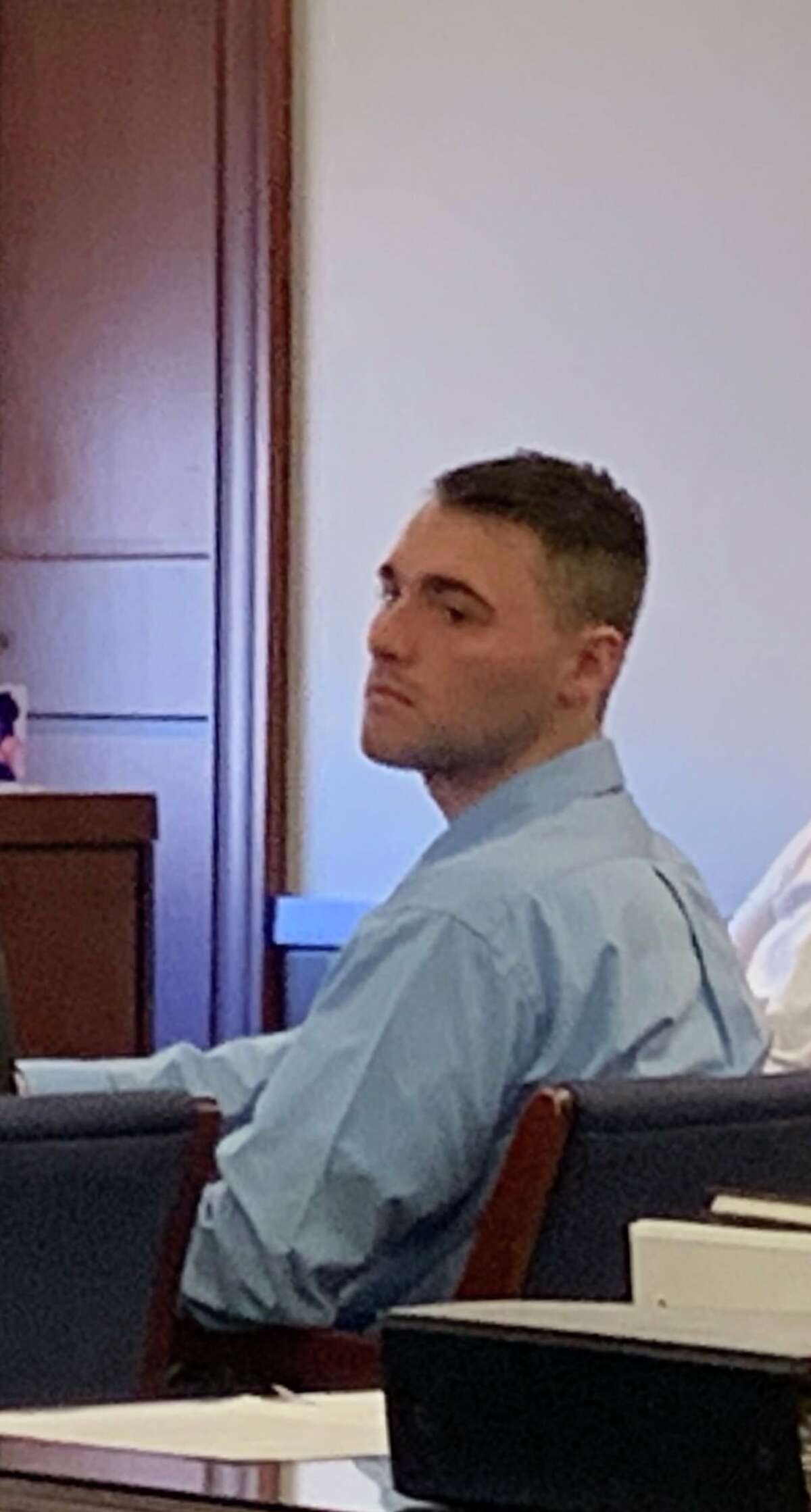 Thomas Slivienski, 23, looks on Thursday as opening arguments are held at his trial in state Supreme Court in Albany where he is accused of killing a teenager who stole his marijuana.
