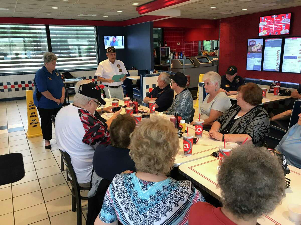 Katy VFW Post 9181 Sr. Vice Commander Tony Hart and Auxiliary Sr. Vice President Pat Byrne honored POW/MIA comrades on Sept. 17 by presenting the Missing Man Table at James Coney Island.