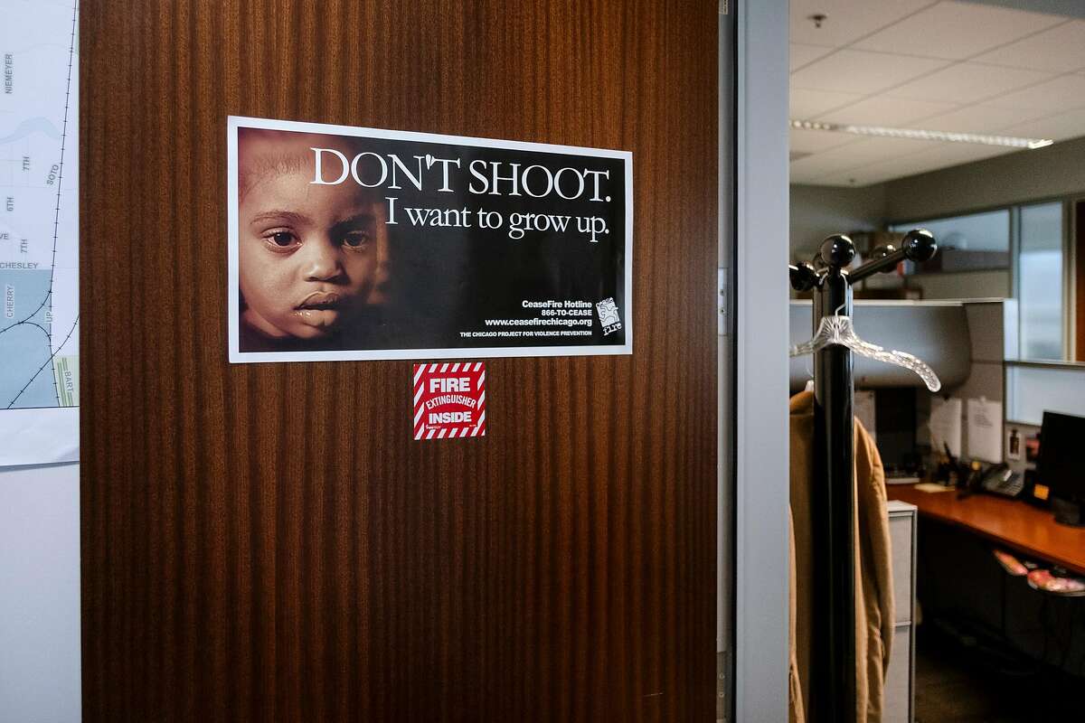 A poster is seen on a door in the City of Richmond's Office of Neighborhood Safety, which runs the city's Operation Peacemaker Fellowship, at City Hall in Richmond, Calif., on Thursday, September 19, 2019.