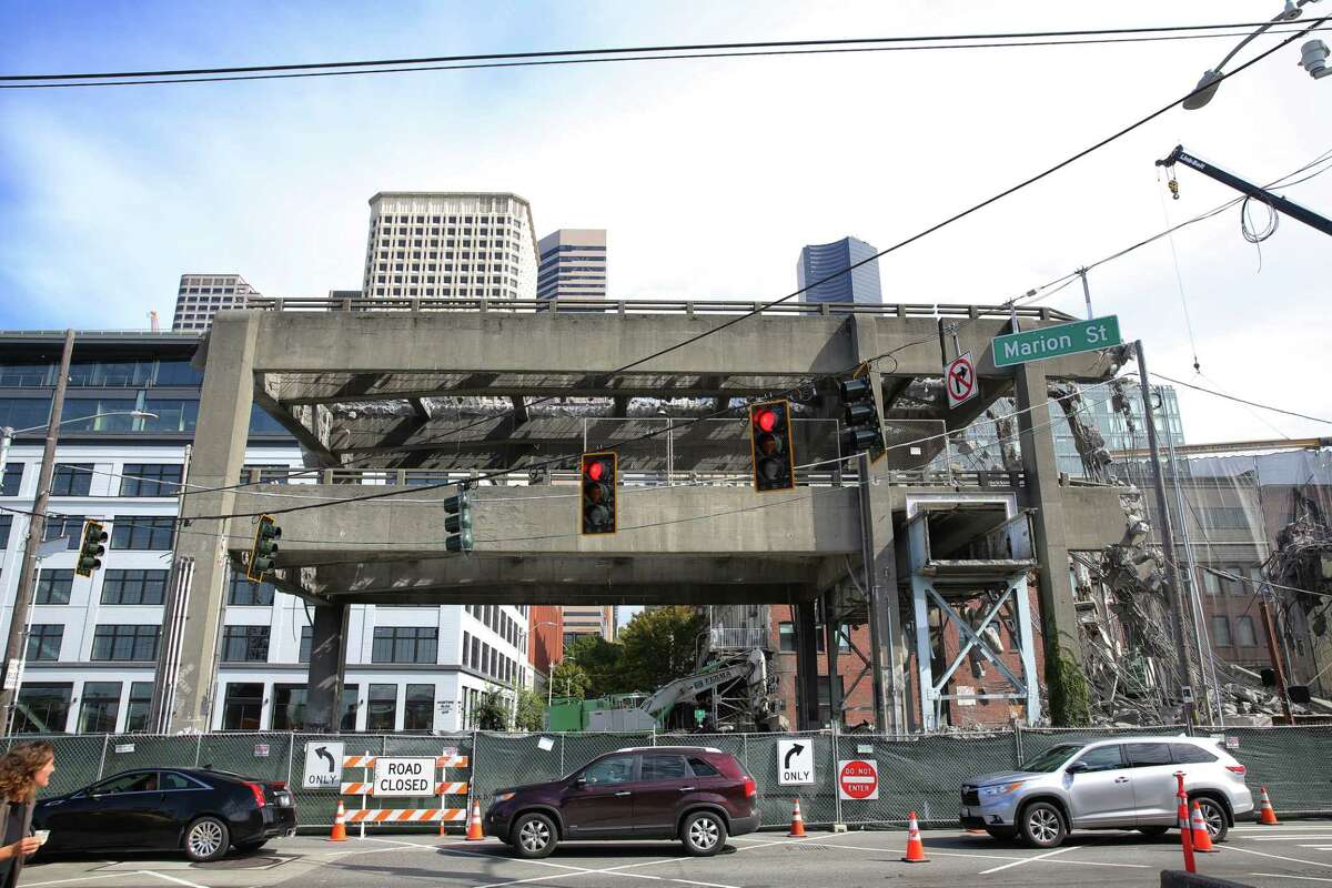 Demoliton crews continue work on the last remaining section of the Alaskan Way Viaduct near Marion Street, which come down over the weekend, Thursday, Sept. 19, 2019.