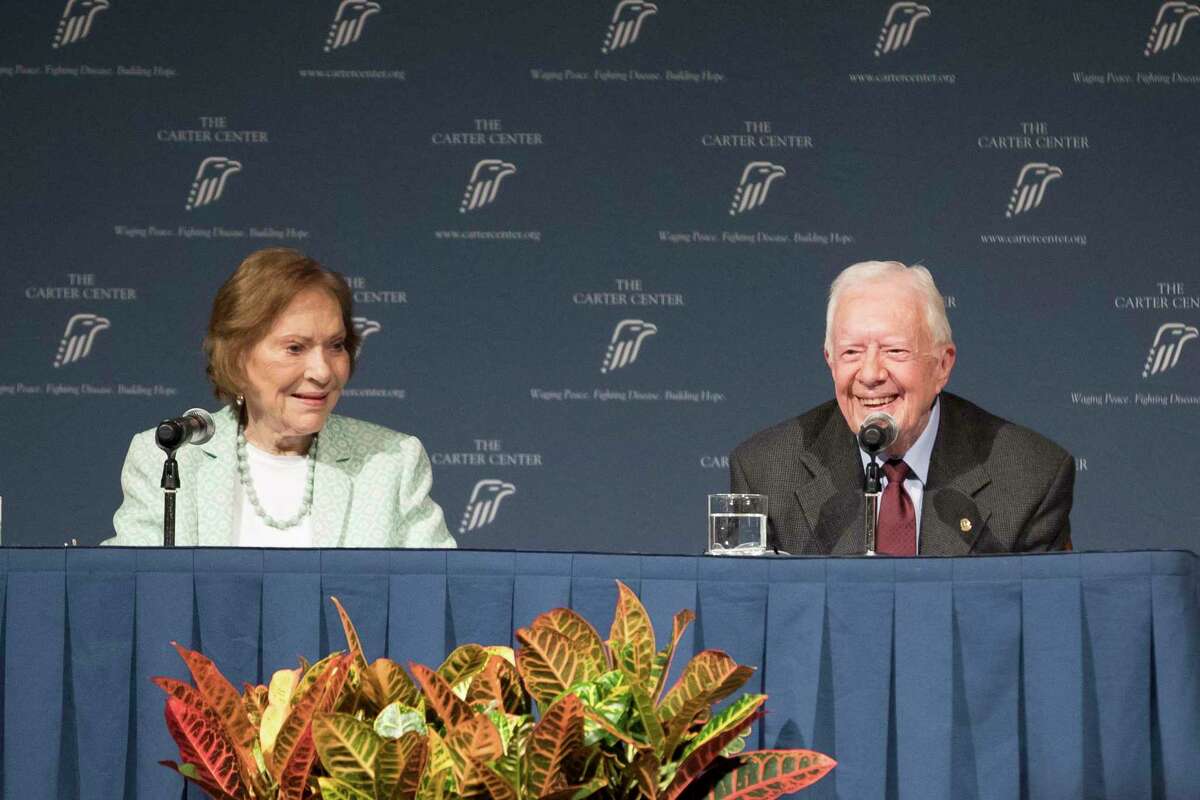Former President Jimmy Carter and Rosalynn Carter talk about the future of The Carter Center and their global work during a town hall, Tuesday, Sept. 17, 2019, in Atlanta. Carter said he doesn’t believe he could have managed the most powerful office in the world as an 80 year old. Carter didn’t tie his answer to any of his fellow Democrats running for president. But two leading 2020 candidates, Joe Biden and Bernie Sanders, would turn 80 during their terms if elected. Biden is 76. Sanders is 78. (Branden Camp/Atlanta Journal-Constitution via AP)