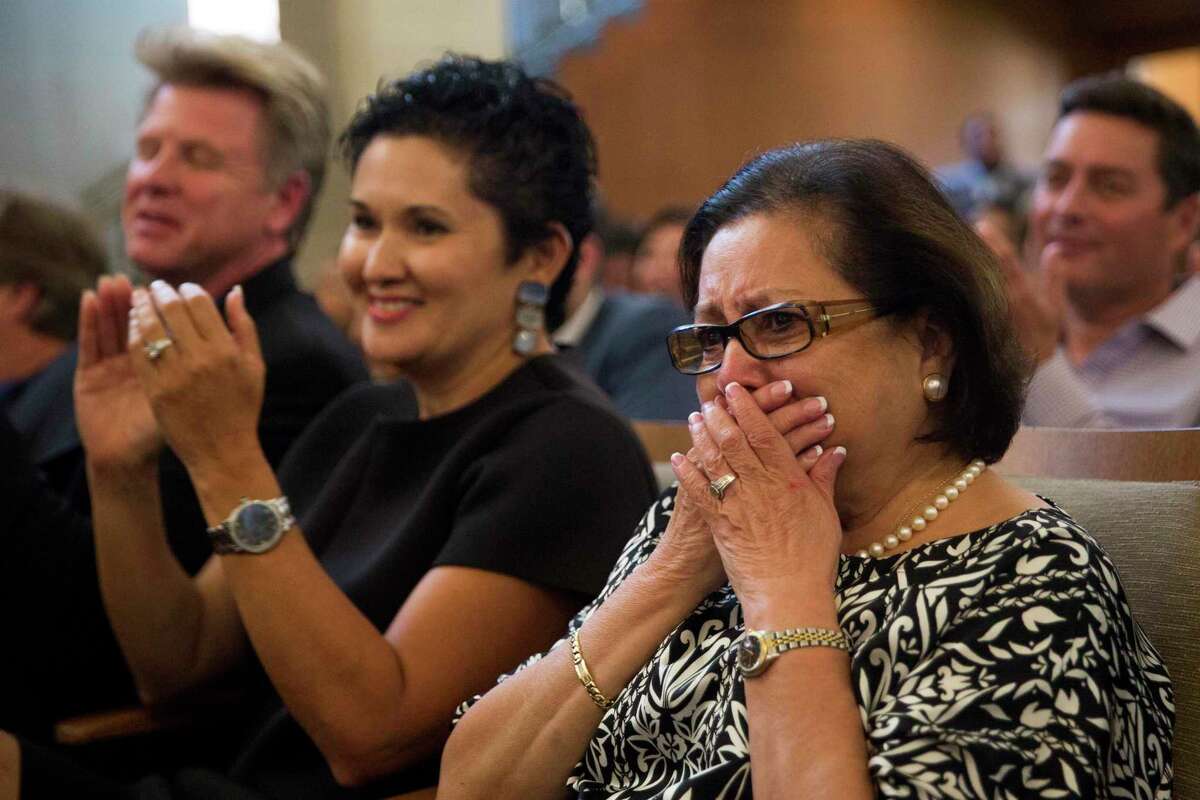 Hope Andrade, right, and Lisa Wong of Go Rio San Antonio react after winning a river barge operation contract in 2017.