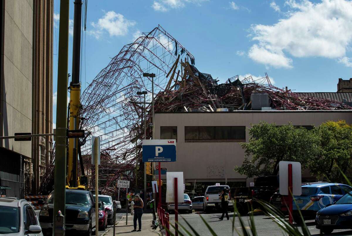 Officials Scaffolding cleanup to close road in front of AT&T building