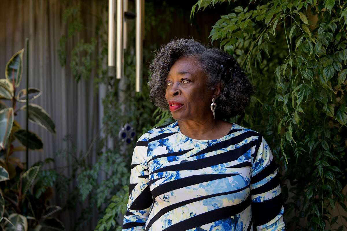 Wanda Williams poses for a portrait among the plants in the backyard of her home in Hayward, Calif. Friday, September 20, 2019.
