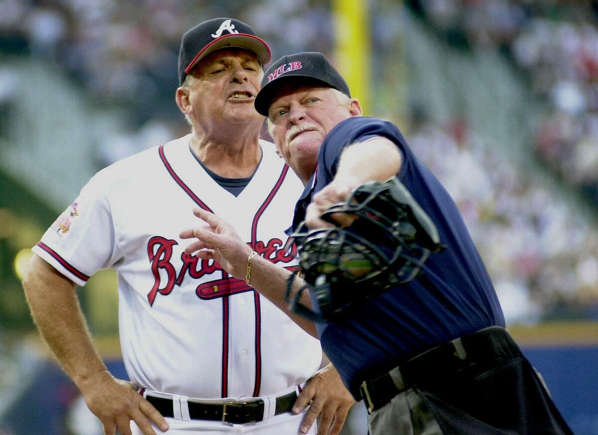 Atlanta Braves manager Bobby Cox, left, continues to yell at home plate umpire John Shulock as Shulock ejects Cox in the first inning against the Milwaukee Brewers on Saturday, June 24, 2000, at Turner Field in Atlanta. Cox was arguing a catcher's balk call on Fernando Lunar. (AP Photo/Erik S. Lesser)