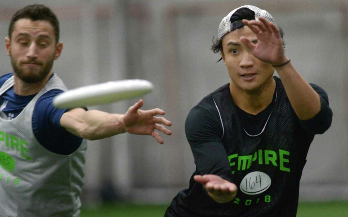 Sam Feder, right, and Josh Alorro try out for the New York Empire, a professional ultimate frisbee team in January 2018 at the SoNo Field house in Norwalk.