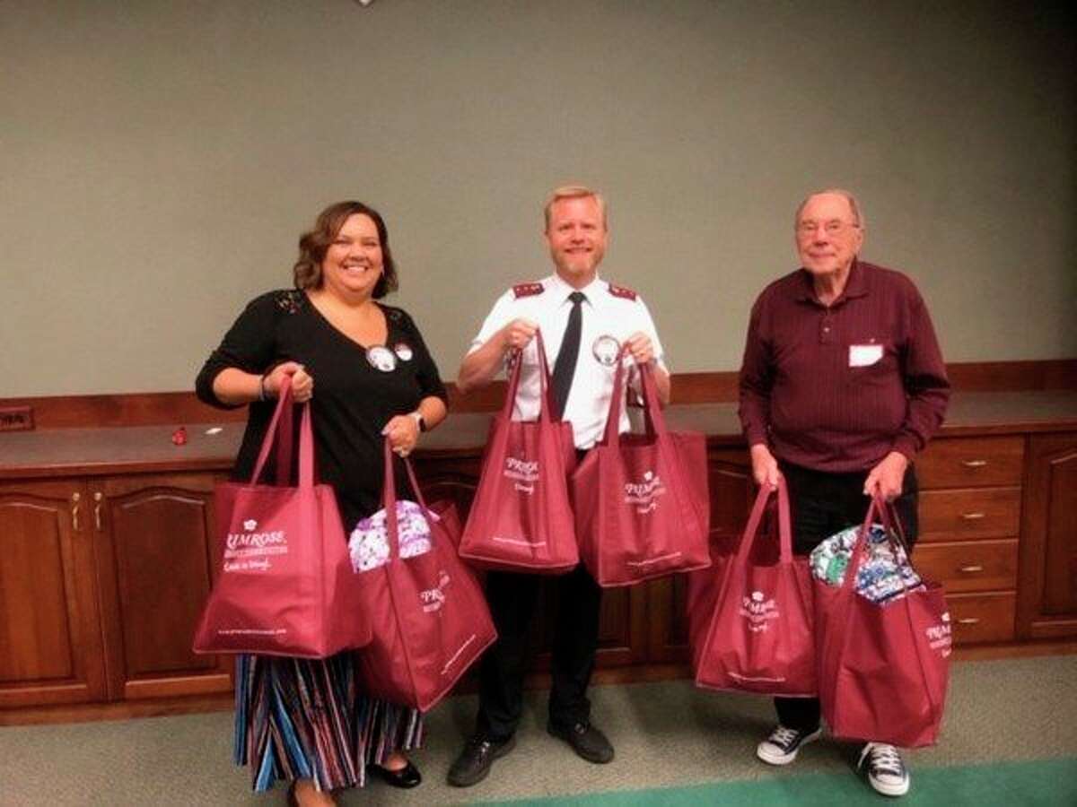 From left, Kiwassee members Crystalee Cook and Midland Salvation Army Captain Brian Goodwill, and Primrose resident Hal Purves. Not pictured: Primrose staff Pam O'Neil and Kiwassee member and Longview Early Childhood Center Director Kim Clark. (Photo provided)