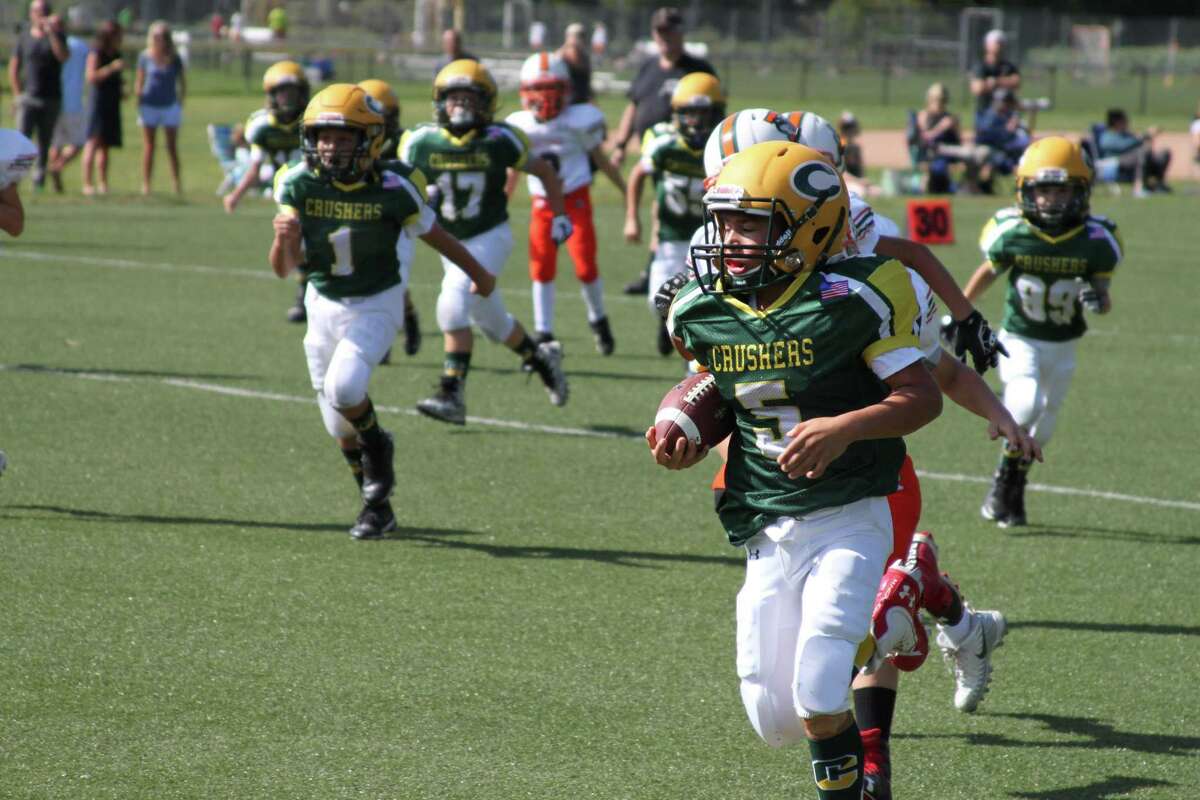 Bantam Crusher Matisse Sostre sprints to the end zone.