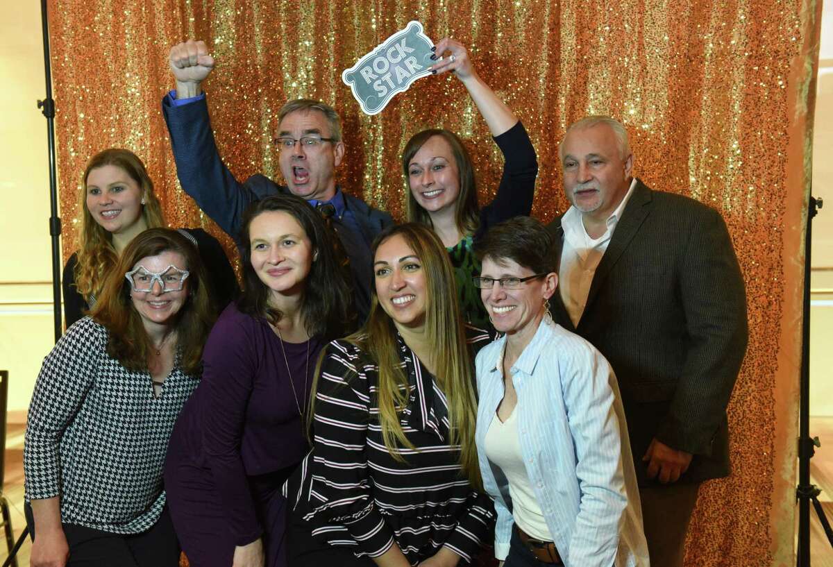 Employees from Chazen Companies have fun at the photo booth set up at the Annual Top Workplaces event at the Albany Capital Center on Tuesday April 9, 2019 in Albany, N.Y. (Lori Van Buren/Times Union)