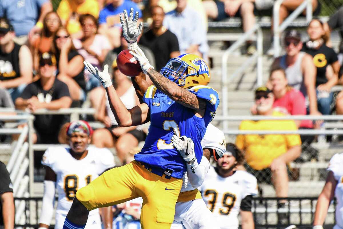 New Haven wide receiver Ju’an Williams hauls in a pass against AIC on Saturday.
