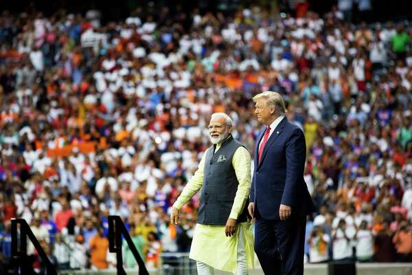 Image result for pm modi and donald trump in stadium