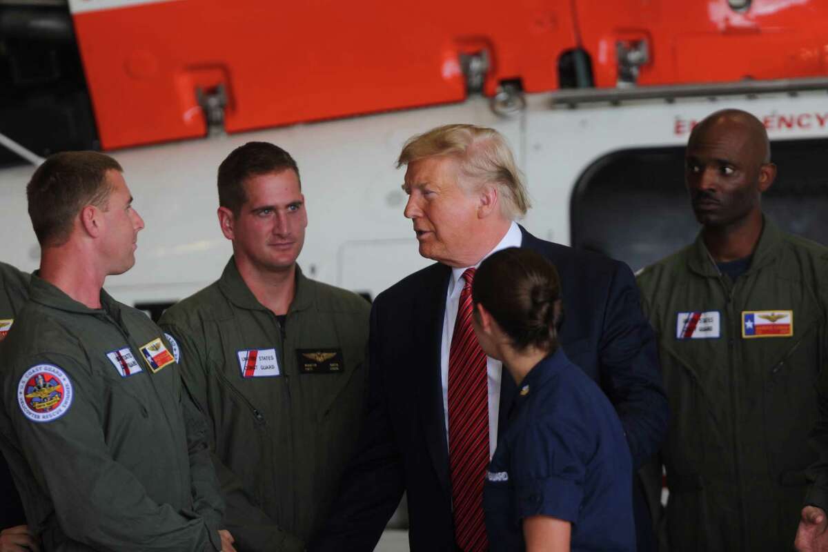 President Donald Trump meets with members of the Coast Guard in Ellington Field Joint Reserve Base, Sunday, Sept. 22, 2019 in Houston.