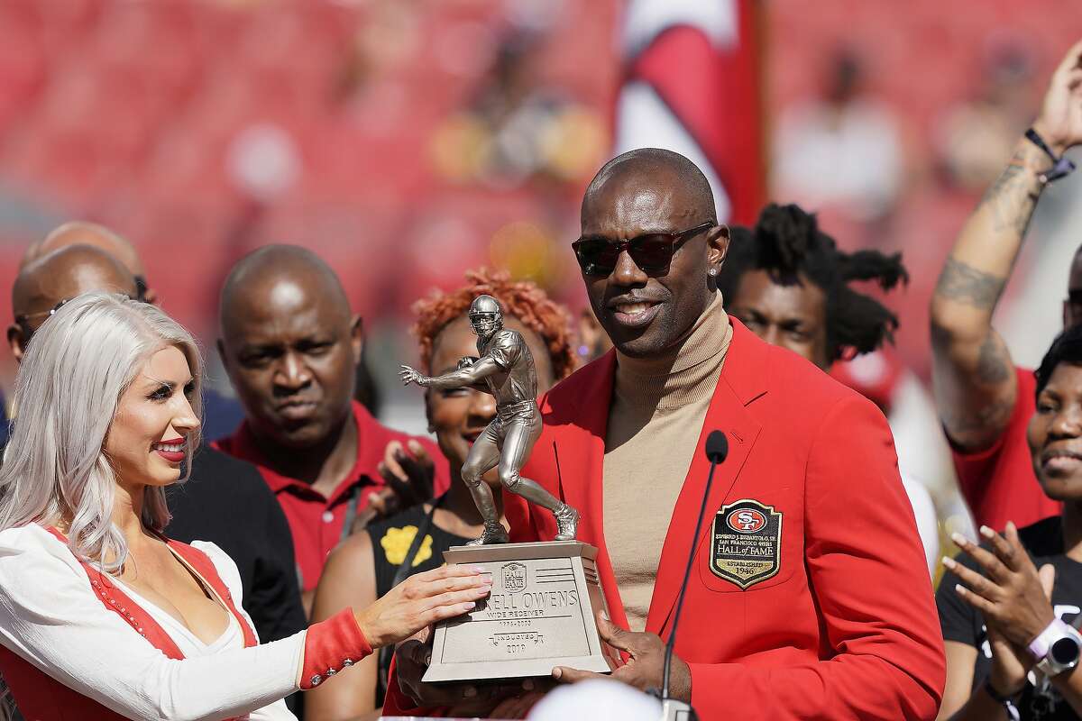 Former San Francisco 49ers wide receiver Terrell Owens is honored during a ceremony as he is inducted into the team's Hall of Fame during halftime of an NFL football game between the 49ers and the Pittsburgh Steelers in Santa Clara, Calif., Sunday, Sept. 22, 2019. (AP Photo/Tony Avelar)