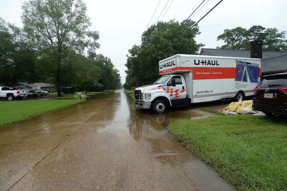 A U-Haul truck sits outside the Crift home in Vidor as the process of recovery from Imelda's torrential rains and flooding begins throughout the region Friday. Photo taken Friday, September 20, 2019 Kim Brent/The Enterprise