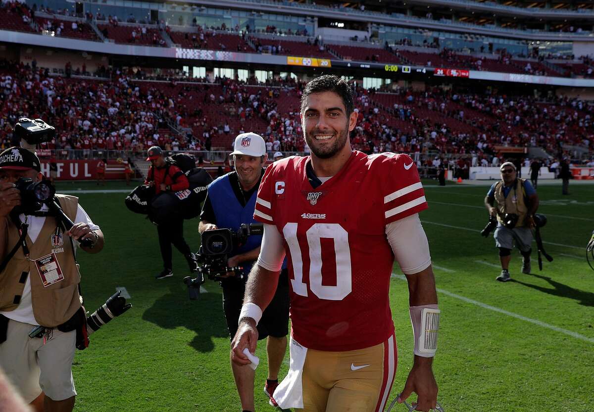 49ers’ Jimmy Garoppolo leaves the field smiling again