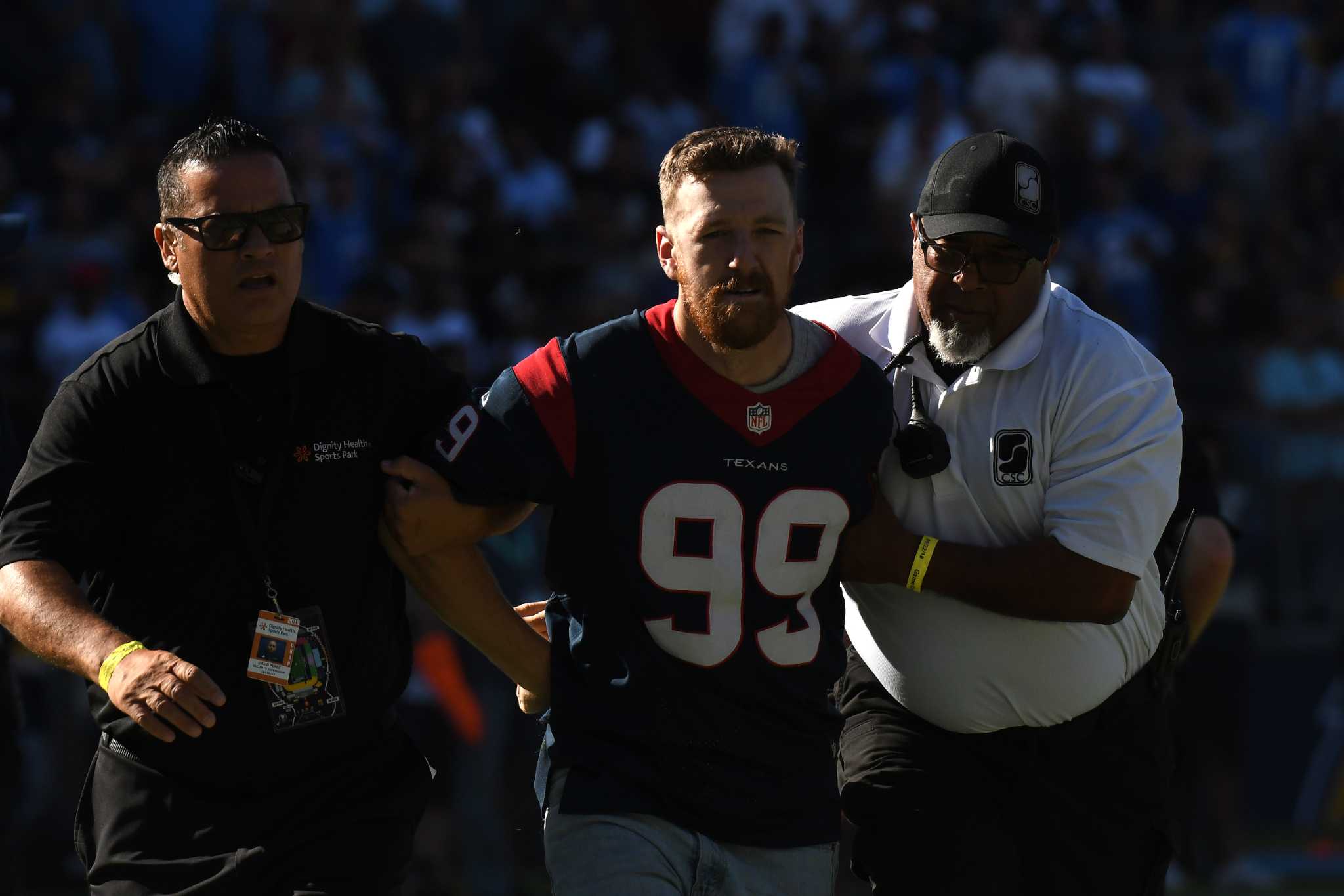 Houston Texans safety A.J. Moore Jr. (33) heads onto the field before the  start of an NFL football game against the Los Angeles Chargers, Sunday,  September 22, 2019 in Carson, Calif. The