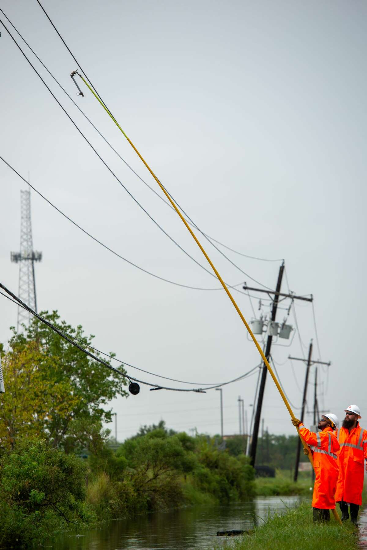 Entergy crews restore power after Tropical Storm Imelda. Photo provided by Entergy Texas