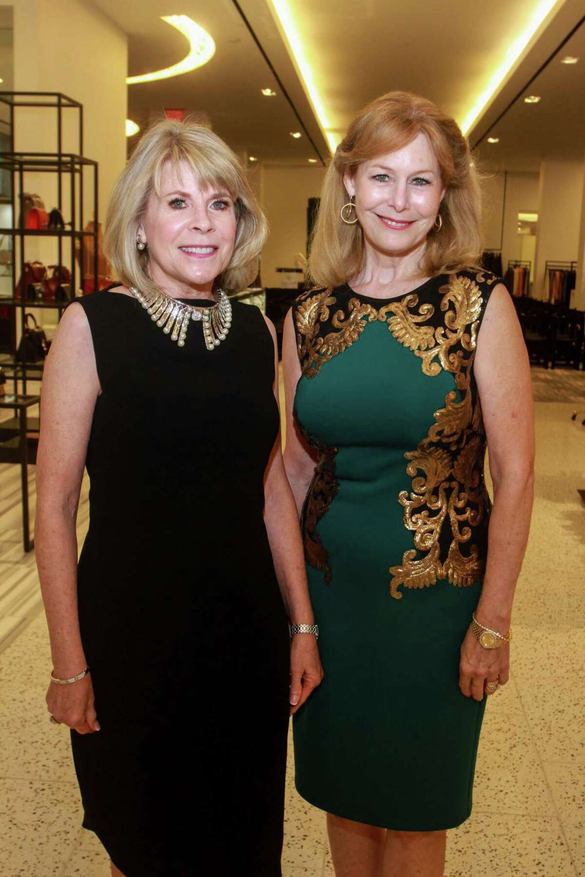 Zane Carruth, left, and Cheryl Byington at the Women of Distinction announcement party