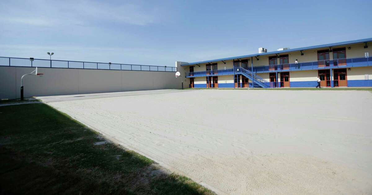 This 2014 photo shows a sand-covered play area at the Karnes County Residential Center in Karnes City. After months of being used to detain adult women, the Karnes County Residential Center will begin holding migrant parents and children again, Immigration and Customs Enforcement said in a statement.