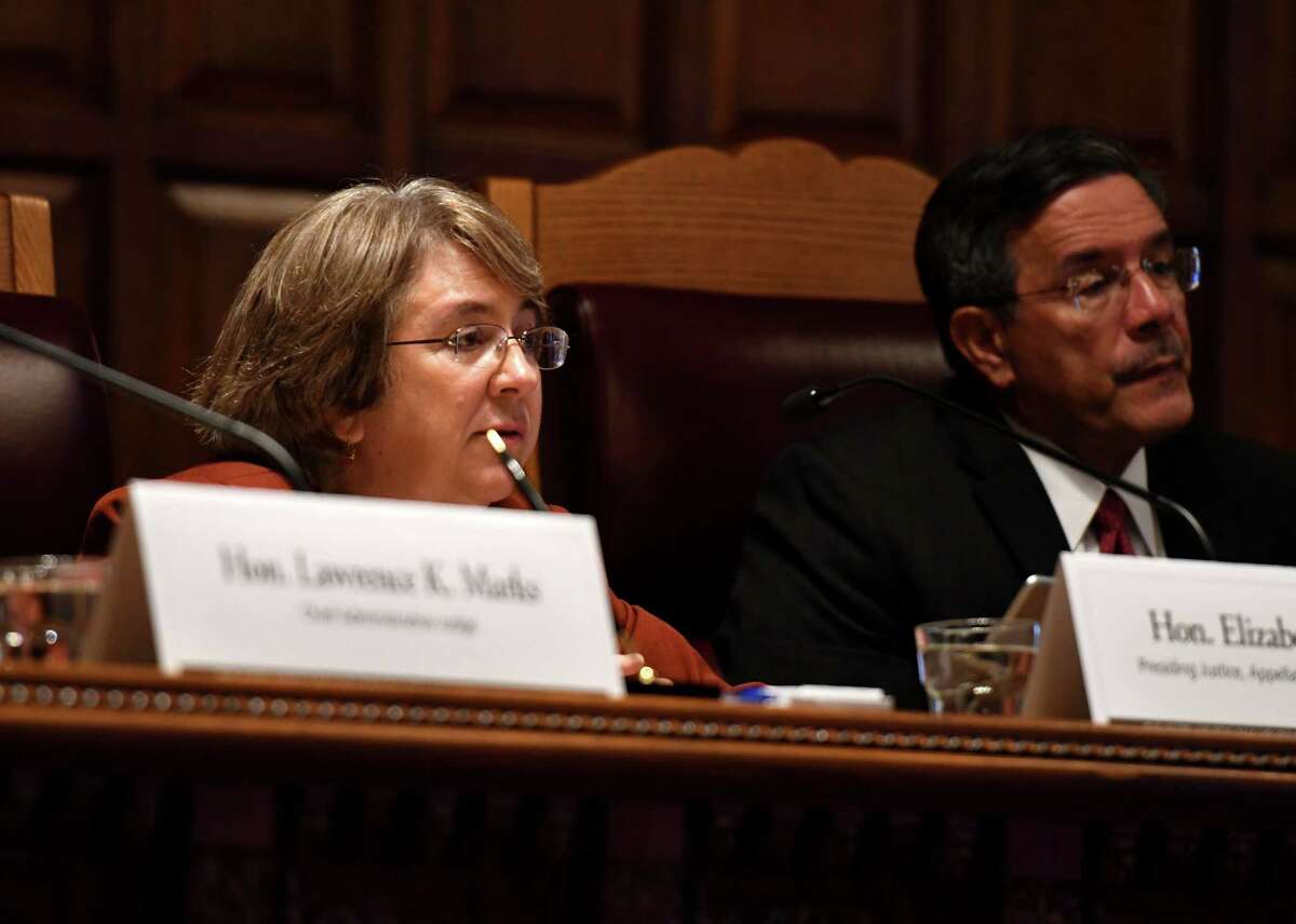 Appellate Justices Elizabeth Garry, left, and Rolando Acosta, right, question presenters during a public hearing to evaluate the civil legal services needs in New York on Monday, Sept. 23, 2019, at the Court of Appeals in Albany, N.Y. (Will Waldron/Times Union)