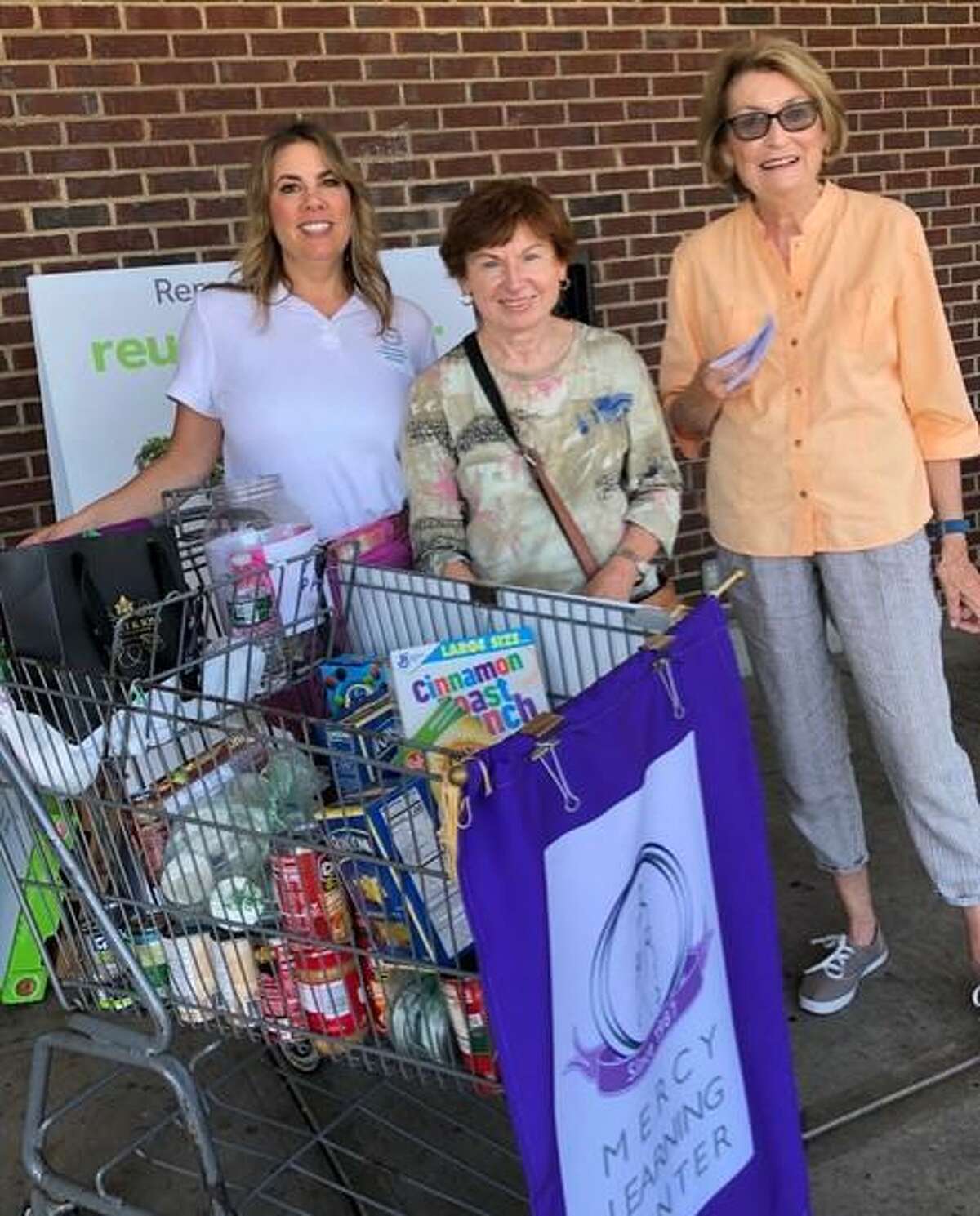 On Saturday, Sept. 21, Trumbull Community Women conducted a food drive at the Stop and Shop on Main Street in Bridgeport. Proceeds and food collected went to the Bridgeport Rescue Mission, which is one of the many service organizations being supported by the women’s group this year. The trio is Julie Howes, Anna Lozynlak and Sheila Hayes.
