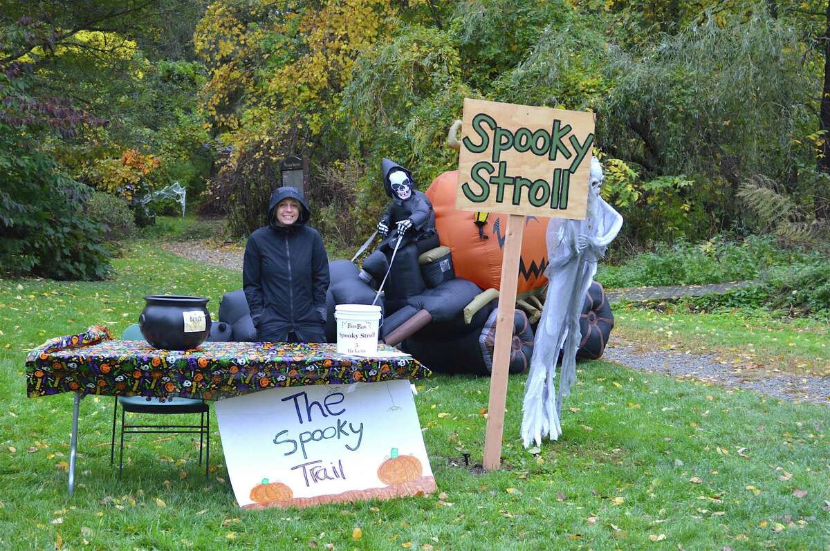 Volunteer Malia Frame of New Canaan manned her post at the Spooky Stroll at the 47th annual New Canaan Nature Center Fall Fair in 2016.