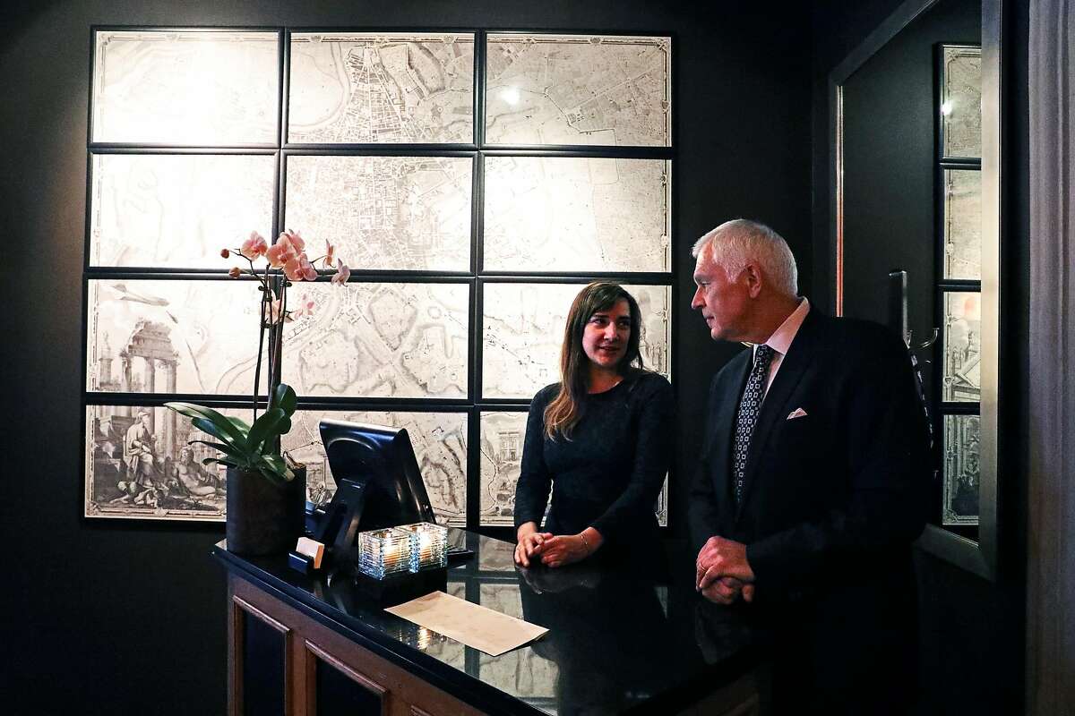 Hostess Emily Benz speaks to Giancarlo Paterlini at Acquerello, located at 1722 Sacramento St., in San Francisco, Calif., on Tuesday, October 30, 2018.