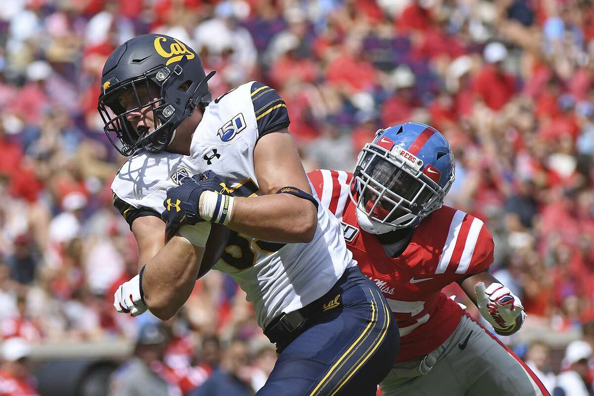 California tight end Jake Tonges shakes off Mississippi defensive back Jalen Julius for a 60-yard touchdown catch during the second half of an NCAA college football game in Oxford, Miss., Saturday, Sept. 21, 2019.